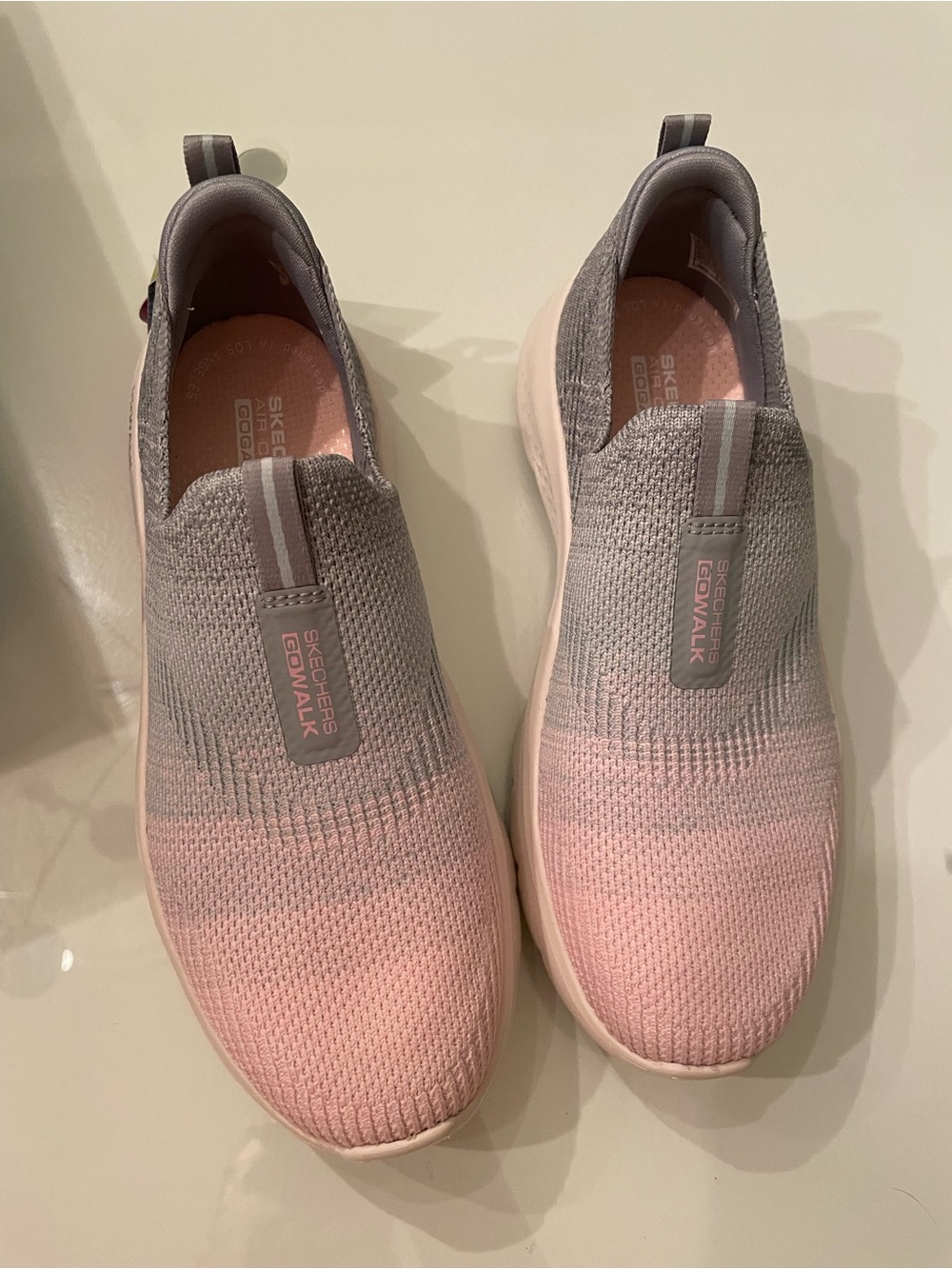 Skechers Slip-On Knit Sneakers in Pink and Gray